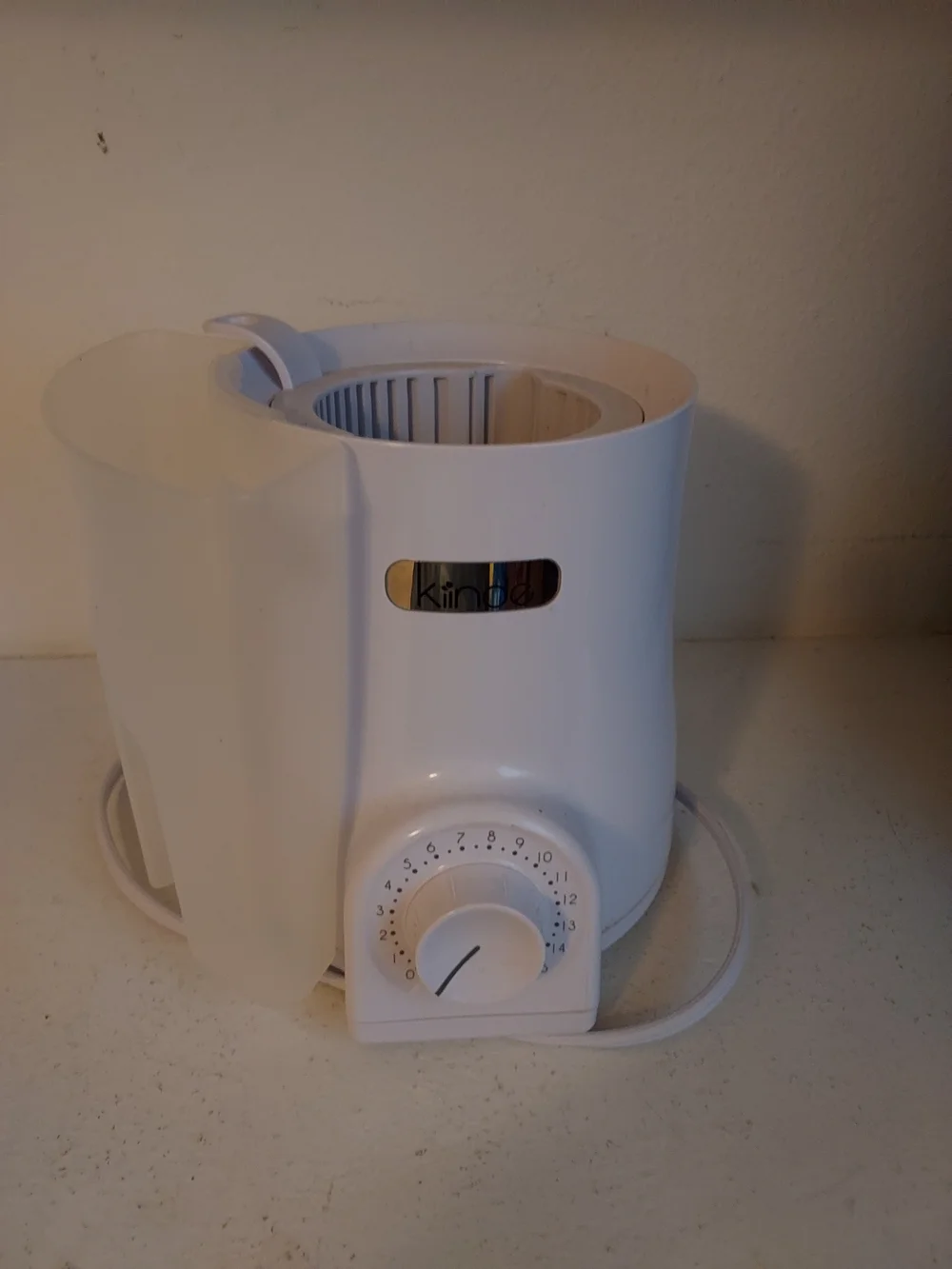 White Kinda Tabletop Appliance with Timer Dial